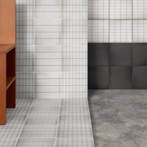 Aurore Light Blue Grid S tile on a shower wall by Vincent Van Duysen