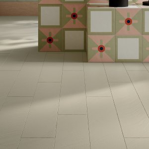 Otto samples on a spec table next to a finish board