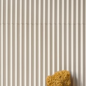 Matt Blue Rombini battens running floor to ceiling
