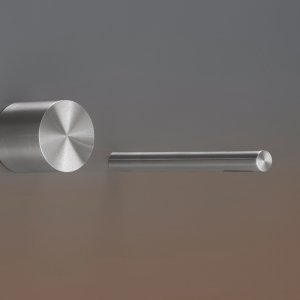 Close-up of the Opus wall-mounted progressive faucet in satin steel