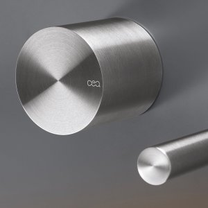 Opus wall-mounted progressive faucet over the washbasin