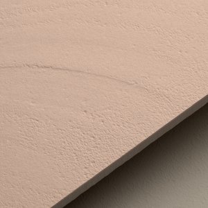 Otto by Mutina Cipria laid in a staggered pattern on a wall