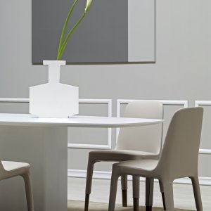 Silver polypropylene glide on the Ester chair leg