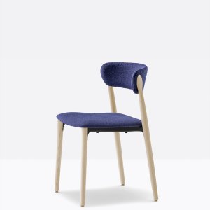 The Nemea armchair pushed fully under the top