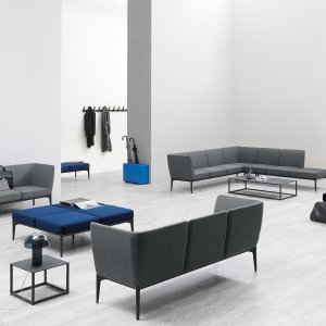 Reception seating with Social by Pedrali along a glazed wall