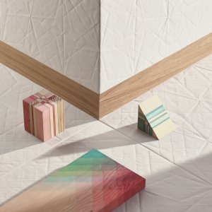 Folded 60x60 porcelain floor in a gallery space