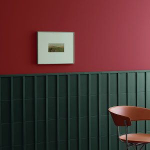 Reception wall clad in Motivo in the Limestone color