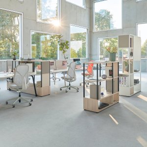 Five se:kit guest chairs stacked on the Sedus trolley