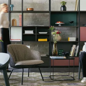 Low, wide se:café soft lounge chair on a natural beech frame