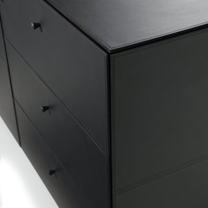 Lacquered plinth under a low cabinet