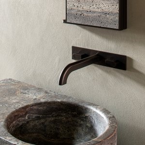Monolithic Sixty washbasin carved in Travertine Titanium marble