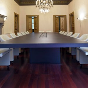 Sockets revealed under the sliding end of the Asymmetrical Meeting table