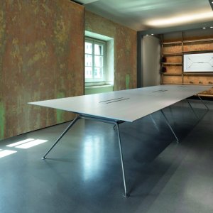 Cosmos structures in Bronze and Titanium finishes with oak tops