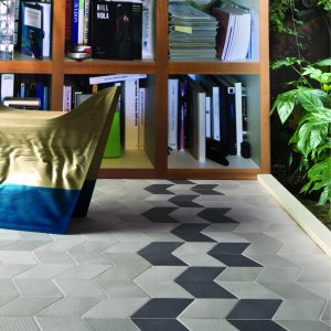 Knitted texture of a Tex tile in Brown under gallery lighting
