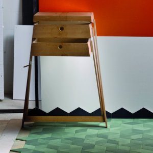 Tex rhombus tiles by Mutina in Olive with knit relief textures across a feature wall