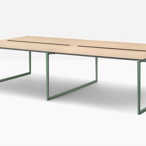 Cover cut from the top laminate closing the cable slot on a Toa desk
