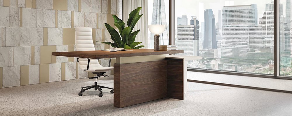 Desk with integrated pedestal